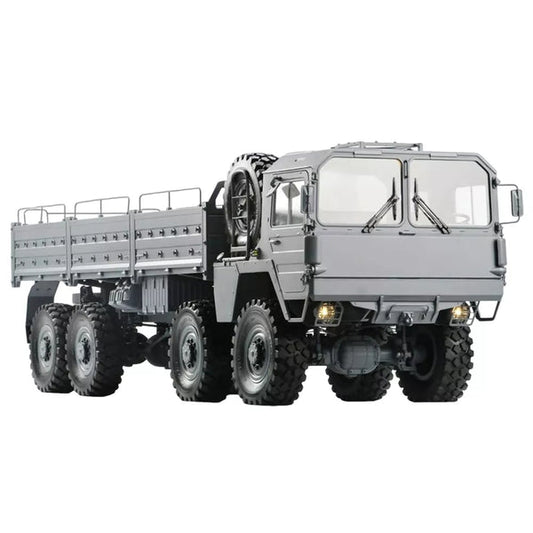 RC military truck driving across gravel terrain