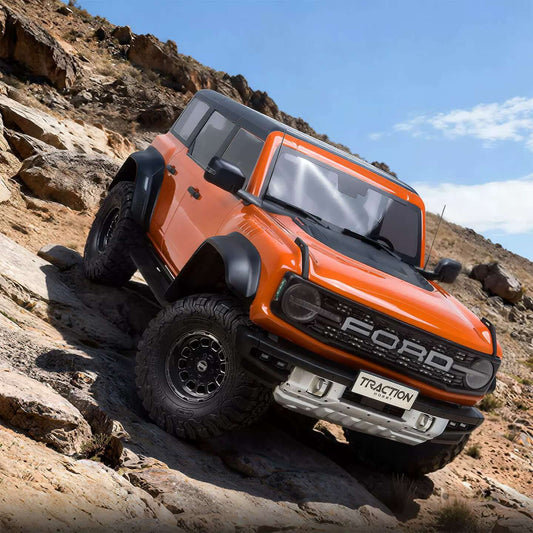 TRACTION HOBBY KM Ford Bronco Raptor 1/8 RTR RC Crawler – Brushless 4WD & Remote Diff Locks Orange - RC Rock Crawler | FUNYAT