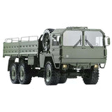 CROSSRC MC6 6WD RC truck driving across gravel terrain